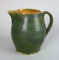 Pennsylvania green glazed redware pitcher attributed to Vickers Pottery Chester County early 19th c