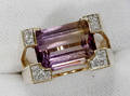 10212 14KT GOLD DIAMOND  CENTER AMETHYST RING