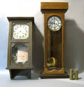 Two oak wall clocks