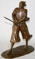 092210 BRONZE SCULPTURE OF A SAMURAI H11 L8 D4