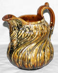 112302 ROCKINGHAM MAJOLICA PITCHER W MOTTLED GLAZE
