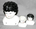 091324 MOLDED PORCELAIN DOLL HEADS