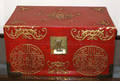 102438 CHINESE RED LACQUERED TRUNK W GILT ACCENTS
