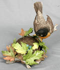 092377 BOEHM BISQUE FIGURE OF ROBIN  NEST