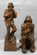 112481 CARVED WOOD FIGURES MAN SMOKING PIPESITTING
