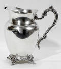100489 ONEIDA SILVER FOOTED WATER PITCHER W ICE LIP