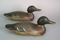Pair of carved and painted duck decoys earlymid 20th c
