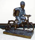 090051 BRONZE GARDEN FIGURE BOY ON BICYCLE