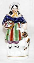 041081 STAFFORDSHIRE POTTERY FIGURE OF A GIRL W CAT