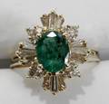050070 OVAL CUT EMERALD DIAMOND  14 KT GOLD RING