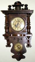 030107 AMERICAN WALNUT WALL CLOCK H 30 W 16 D 7