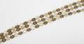 061282 14KT GOLD TRIPLESTRAND BRACELET L 8 11g