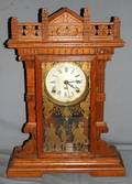 060132 EASTLAKE STYLE OAK MANTLE CLOCK H 23 W 16