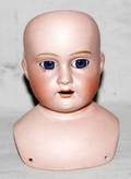 061536 MB JAPAN BISQUE DOLLS HEAD W BLUE GLASS EYES