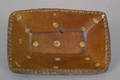Pennsylvania miniature redware loaf dish mid 19th c