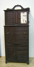 Elaborate oak dentists cabinet