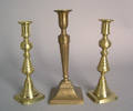 Three brass candlesticks