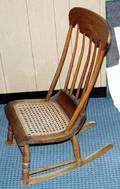 051524 MAPLE ROCKING CHAIR W A CANE SEAT 19TH C