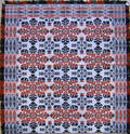 Red blue green and white jacquard coverlet dated 1852
