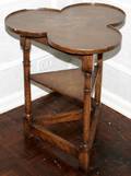 032435 OAK CLOVERLEAF SHAPED TABLE H 23 DIA 20