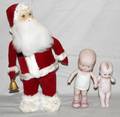 031633 ANIMATED SANTA  2 BISQUE DOLLS