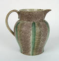 Brown purple and green rainbow spatter pitcher