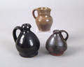 Two miniature redware jugs late 19th c