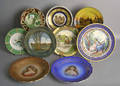 Nine painted porcelain plates to include Royal Doulton
