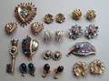 Nine pairs of Trifari rhinestone clip earrings