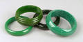 Four green bakelite bangles