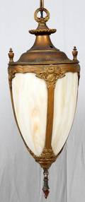 PATINATED METAL AND CARAMEL GLASS HANGING LAMP