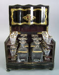 English ebonized cased liquor set 19th c