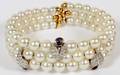 18KT YELLOW GOLD PEARL CUFF BRACELET TW 44 GR