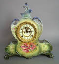 Ansonia porcelain mantle clock with Royal Bonn La Vendee case and open escapement