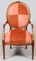 UPHOLSTERED CARVED WALNUT OPEN ARM CHAIR