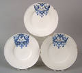 Three similar Dutch delft wide rimmed plates dated 1687 1691 and 1692