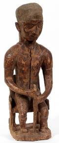BIDJOGO WOOD SEATED MALE ANCESTOR FIGURE