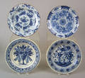 Four English blue and white delft plates mid 18th c