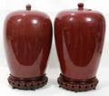 090002 CHINESE SANG DE BOEUF PORCELAIN COVERED URNS
