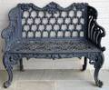 KRAMER BROS PAINTED BLACK CAST IRON BENCH