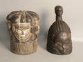 Two carved African helmet masks