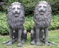 BRONZE SEATED GARDEN LIONS PAIR