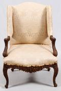 CARVED WALNUT OPEN ARMCHAIR
