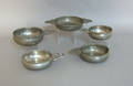 Five pewter porringers