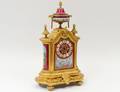 LOUIS XVI STYLE GILT BRONZE AND PORCELAIN MANTEL CLOCK