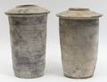 TWO HAN STYLE POTTERY FUNERARY URNS