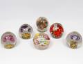 GROUP OF SIX GLASS PAPERWEIGHTS