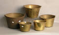 Five brass buckets