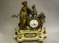 French Neoclassical Giltmetal Figural and Alabaster Mantel Clock