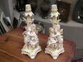 Pair of Continental Porcelain Figural Cupid Candleholders